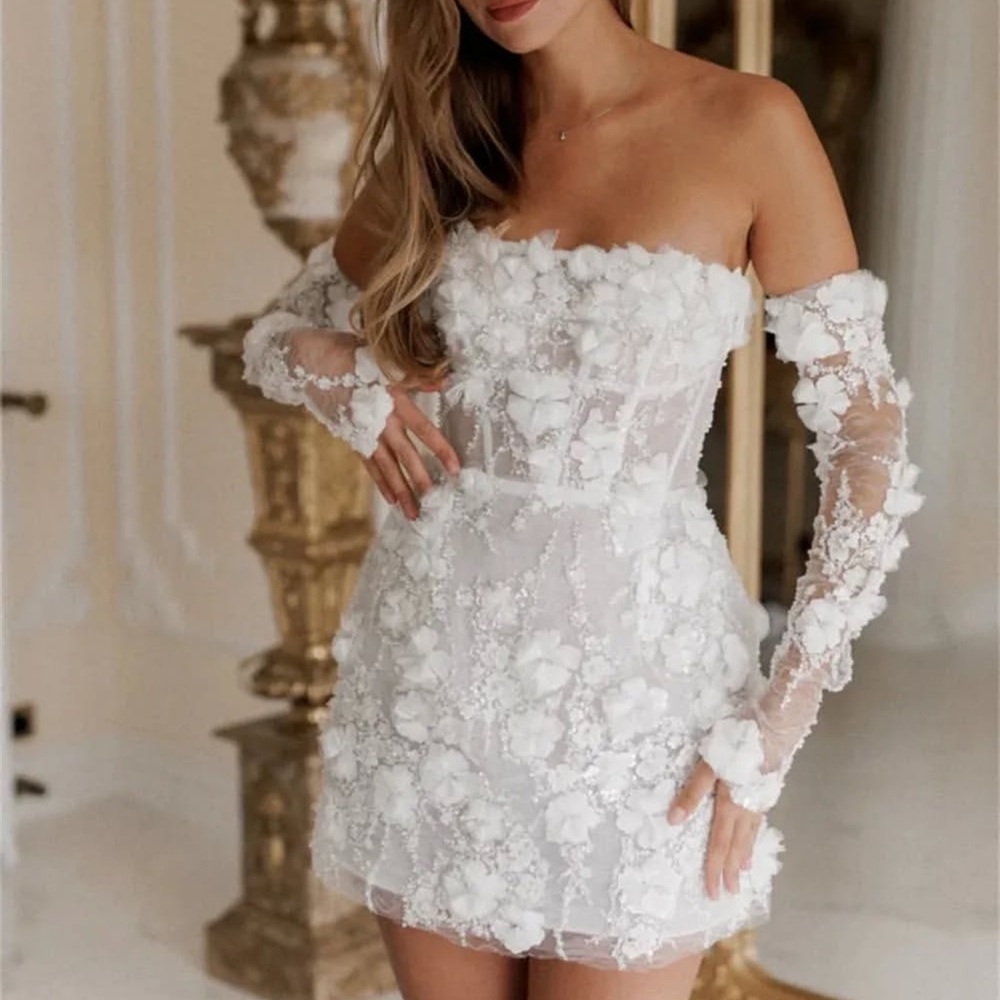 Velluto Roso Kayla Mini Dress
Elegant White Floral Off-Shoulder Dress